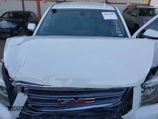 2017 GMC Yukon SLE with VIN 1GKS1AKC5HR314970, listed as a IAAI auction lot 41671049 with 117,126 mi miles. Bid and sale history available at carsss.com. Image 10.
