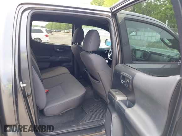 2017 Toyota Tacoma SR5 with VIN 3TMAZ5CN7HM026618, listed as a IAAI auction lot 42033682 with 96,430 mi miles and . Bid and sale history available at carsss.com. Image 8.