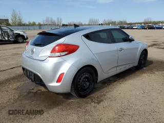 2013 Hyundai Veloster w/Black Int с VIN KMHTC6AD4DU139261, выставлен на аукционе Copart как лот 56175095 с пробегом 148 483 миль миль и Чистый • Clean title. История ставок и продаж доступна на DreamBid. Изображение 3.