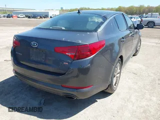 2011 Kia Optima LX with VIN KNAGM4A71B5061995, listed as a IAAI auction lot 42129683 with 207,110 mi miles and . Bid and sale history available at carsss.com. Image 4.