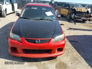 2002 Mazda Protege z VIN JM1BJ245221631014, wystawiony jako IAAI lot #42232912 z przebiegiem 180 184 mil mil oraz . Historia ofert i sprzedaży dostępna na DreamBid. Obrazek 11.