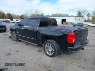 2016 Chevrolet Silverado 1500 High Country with VIN 3GCUKTEC2GG344953, listed as a IAAI auction lot 40700121 with 107,623 mi miles and . Bid and sale history available at DreamBid. Image 3.