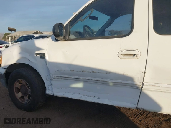 2003 Ford F-150 XL with VIN 2FTRX17L13CB04616, listed as a IAAI auction lot 41114369 with Not provided miles and . Bid and sale history available at DreamBid. Image 6.
