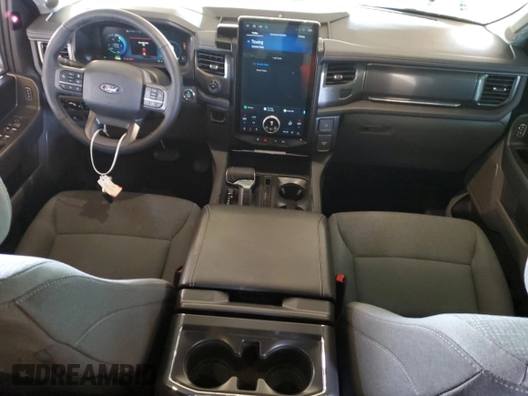 2024 Ford F-150 Lightning Flash с VIN 1FT6W3L72RWG16991, выставлен на аукционе Copart как лот 51786465 с пробегом 7 532 миль миль и Списание • Salvage title. История ставок и продаж доступна на DreamBid. Изображение 8.