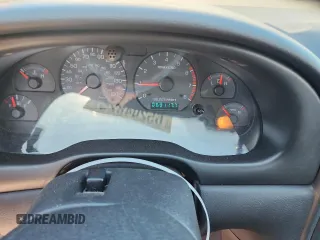 2000 Ford Mustang GT with VIN 1FAFP45X7YF265824, listed as a Copart auction lot 65204825 with 69,117 mi miles and Salvage title. Bid and sale history available at DreamBid. Image 9.