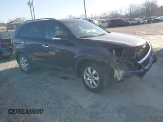 2012 Kia Sorento LX with VIN 5XYKTCA61CG221464, listed as a IAAI auction lot 41762388 with 155,076 mi miles. Bid and sale history available at carsss.com. Image 1.