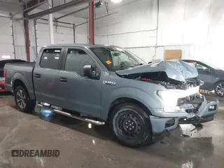 2019 Ford F-150 XL with VIN 1FTEW1EP4KKE93155, listed as a IAAI auction lot 41319964 with 105,248 mi miles. Bid and sale history available at carsss.com. Image 14.