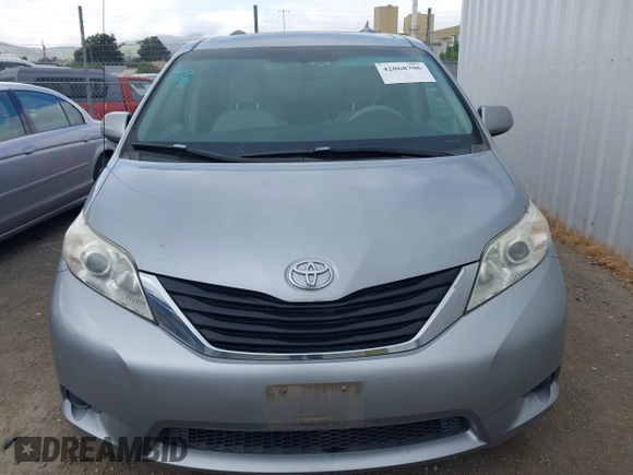 2012 Toyota Sienna LE AAS with VIN 5TDKK3DC1CS193107, listed as a IAAI auction lot 42068706 with 106,930 mi miles and . Bid and sale history available at DreamBid. Image 6.