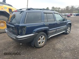 2004 Jeep Grand Cherokee Laredo with VIN 1J4GW48JX4C278260, listed as a IAAI auction lot 42046644 with 131,359 mi miles and . Bid and sale history available at DreamBid. Image 4.