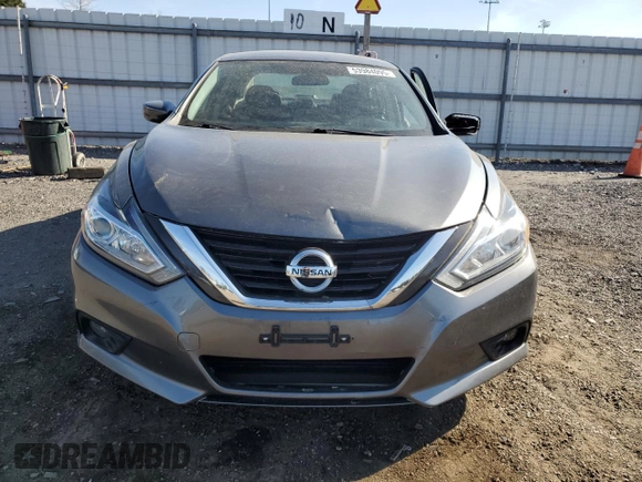 2018 Nissan Altima SV with VIN 1N4AL3AP1JC209746, listed as a Copart auction lot 53984095 with 58,823 mi miles and Salvage Title. Bid and sale history available at carsss.com. Image 5.