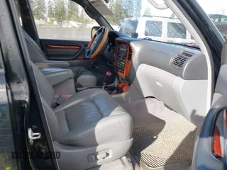 2001 Lexus LX 470 with VIN JTJHT00W613500563, listed as a IAAI auction lot 41730804 with 232,647 mi miles and . Bid and sale history available at carsss.com. Image 5.