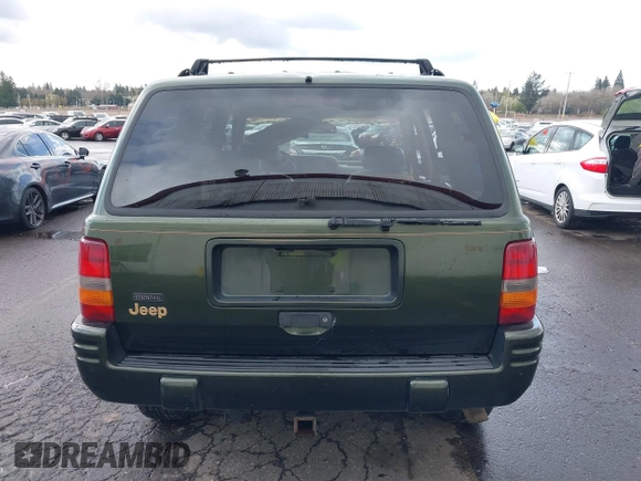 1996 Jeep Grand Cherokee Limited with VIN 1J4GZ78S0TC235692, listed as a IAAI auction lot 41945617 with Not provided miles and . Bid and sale history available at DreamBid. Image 16.