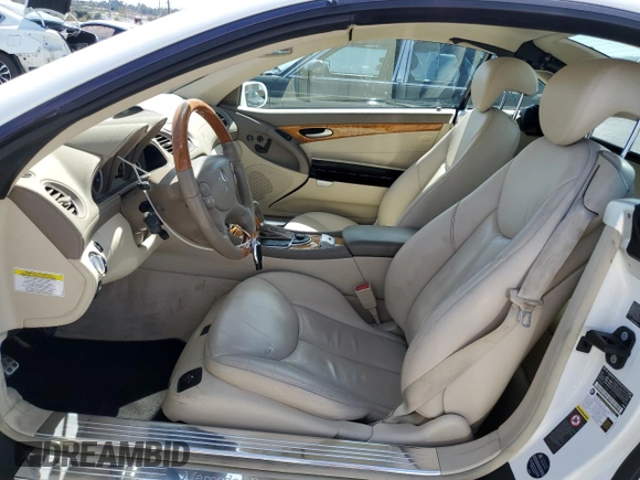 2008 Mercedes-Benz SL 550 with VIN WDBSK71FX8F141776, listed as a Copart auction lot 50004185 with 58,668 mi miles and Salvage title. Bid and sale history available at DreamBid. Image 7.