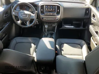 2022 GMC Canyon 4WD AT4 w/Leather with VIN 1GTG6FENXN1155709, listed as a Copart auction lot 87508475 with 10,259 mi miles and Salvage Title. Bid and sale history available at carsss.com. Image 8.
