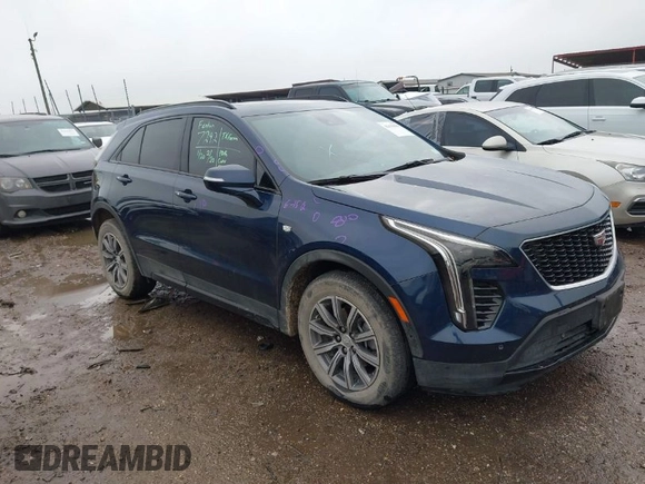 2022 Cadillac XT4 FWD Sport with VIN 1GYFZER44NF151862, listed as a IAAI auction lot 41429850 with 9,854 mi miles. Bid and sale history available at carsss.com. Image 1.