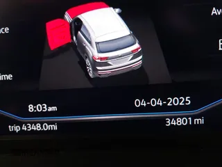 2023 Volkswagen Atlas SE z VIN 1V2KC2CA6PC210593, wystawiony jako IAAI lot #41957633 z przebiegiem 34 801 mil mil oraz . Historia ofert i sprzedaży dostępna na DreamBid. Obrazek 7.