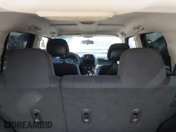2014 Jeep Patriot Altitude with VIN 1C4NJPBA7ED731400, listed as a IAAI auction lot 41730428 with 118,642 mi miles and . Bid and sale history available at DreamBid. Image 17.