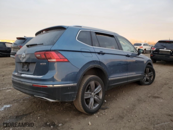 2020 Volkswagen Tiguan SE with VIN 3VV2B7AXXLM181344, listed as a Copart auction lot 87182794 with 62,145 mi miles and Salvage Title. Bid and sale history available at carsss.com. Image 3.