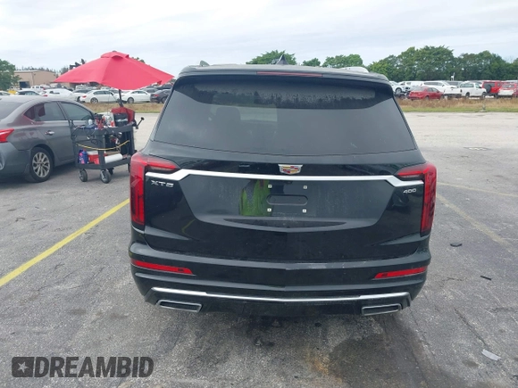 2023 Cadillac XT6 FWD Premium Luxury with VIN 1GYKPCRS6PZ106284, listed as a IAAI auction lot 41595617 with 32,795 mi miles and . Bid and sale history available at DreamBid. Image 17.