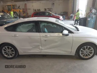 2020 Ford Fusion SE with VIN 3FA6P0HD4LR165511, listed as a IAAI auction lot 42136252 with 30,709 mi miles and . Bid and sale history available at DreamBid. Image 13.