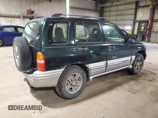 2002 Chevrolet Tracker LT z VIN 2CNBJ634126949974, wystawiony jako Copart lot #54819695 z przebiegiem 200 895 mil mil oraz Szkoda całkowita • Salvage title. Historia ofert i sprzedaży dostępna na DreamBid. Obrazek 3.