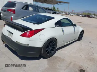 2004 Nissan 350Z Touring with VIN JN1AZ34E34T060024, listed as a IAAI auction lot 42327915 with 96,197 mi miles and . Bid and sale history available at DreamBid. Image 4.