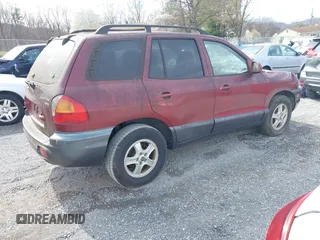 2003 Hyundai Santa Fe GLS with VIN KM8SC13E43U526945, listed as a IAAI auction lot 41847683 with 180,986 mi miles. Bid and sale history available at carsss.com. Image 4.