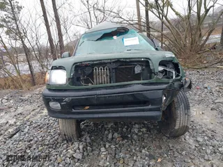 2002 Toyota Tundra SR5 with VIN 5TBRT34122S326071, listed as a IAAI auction lot 41537852 with 218,561 mi miles. Bid and sale history available at carsss.com. Image 12.
