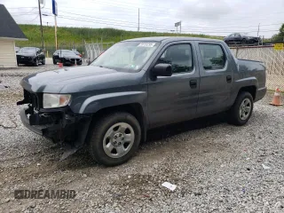 2010 Honda Ridgeline RT with VIN 5FPYK1F26AB005466, listed as a Copart auction lot 59753295 with 143,520 mi miles and Salvage title. Bid and sale history available at DreamBid. Image 1.