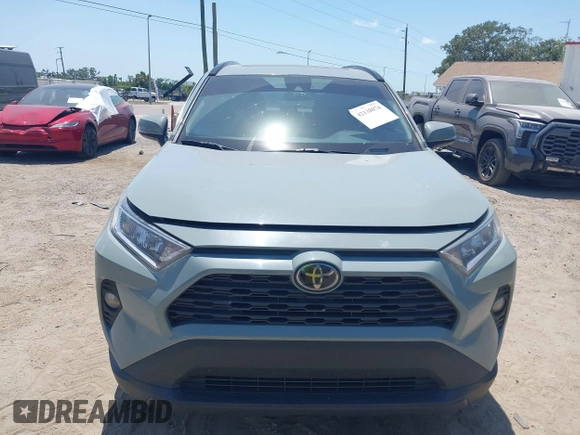 2020 Toyota RAV4 XLE with VIN 2T3W1RFV0LW069849, listed as a IAAI auction lot 42138074 with 112,062 mi miles and . Bid and sale history available at DreamBid. Image 12.