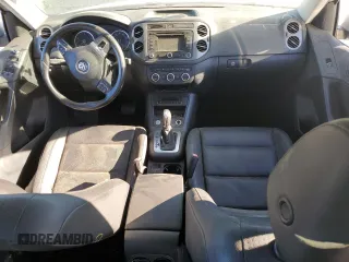 2014 Volkswagen Tiguan SE with VIN WVGAV3AX9EW611860, listed as a Copart auction lot 74431754 with 116,022 mi miles and Salvage title. Bid and sale history available at DreamBid. Image 8.