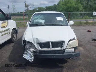 2005 Kia Sedona LX with VIN KNDUP132056702484, listed as a IAAI auction lot 42099572 with 195,528 mi miles and . Bid and sale history available at DreamBid. Image 12.