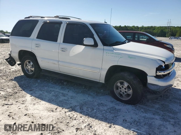 2003 Chevrolet Tahoe LS with VIN 1GNEC13Z03J213727, listed as a Copart auction lot 57206395 with 191,202 mi miles and Salvage title. Bid and sale history available at DreamBid. Image 4.