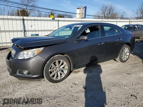 2013 Chevrolet Malibu LTZ with VIN 1G11H5SA6DF199549, listed as a Copart auction lot 49041735 with 130,367 mi miles and Salvage Title. Bid and sale history available at DreamBid. Image 1.