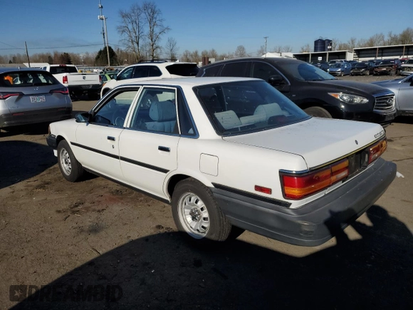 1991 Toyota Camry z VIN 4T1SV24E0MU424347, wystawiony jako Copart lot #42566695 z przebiegiem 162 334 mil mil oraz Szkoda całkowita • Salvage title. Historia ofert i sprzedaży dostępna na DreamBid. Obrazek 2.