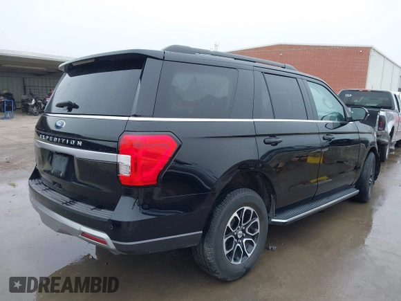 2023 Ford Expedition XLT with VIN 1FMJU1H86PEA14891, listed as a IAAI auction lot 41514898 with 56,592 mi miles. Bid and sale history available at carsss.com. Image 4.
