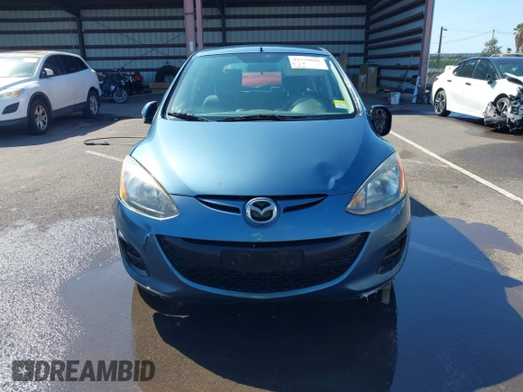 2014 Mazda 2 Sport with VIN JM1DE1KY0E0181555, listed as a IAAI auction lot 41539841 with 121,918 mi miles and . Bid and sale history available at DreamBid. Image 12.
