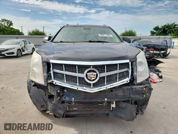 2012 Cadillac SRX Premium Collection with VIN 3GYFNCE3XCS596550, listed as a Copart auction lot 63011585 with 98,004 mi miles and Salvage title. Bid and sale history available at DreamBid. Image 5.