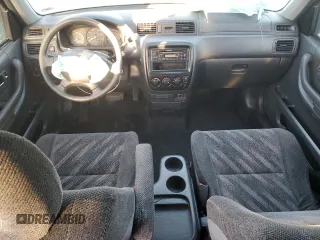 2000 Honda CR-V EX with VIN JHLRD1863YC017768, listed as a Copart auction lot 76383504 with 223,753 mi miles and Salvage Title. Bid and sale history available at carsss.com. Image 8.