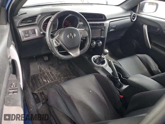 2014 Scion tC z VIN JTKJF5C76E3087992, wystawiony jako Copart lot #56058445 z przebiegiem 84 387 mil mil oraz Czysty tytuł • Clean title. Historia ofert i sprzedaży dostępna na DreamBid. Obrazek 8.