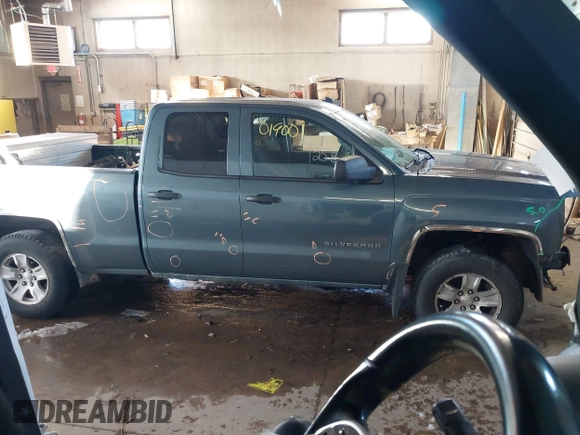 2014 Chevrolet Silverado 1500 LT with VIN 1GCVKREC0EZ130211, listed as a IAAI auction lot 41601900 with 209,604 mi miles and . Bid and sale history available at DreamBid. Image 14.