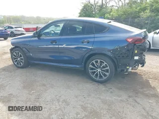 2023 BMW X6 xDrive40i z VIN 5UXCY6C07P9P85707, wystawiony jako IAAI lot #42075043 z przebiegiem 25 218 mil mil oraz . Historia ofert i sprzedaży dostępna na DreamBid. Obrazek 3.