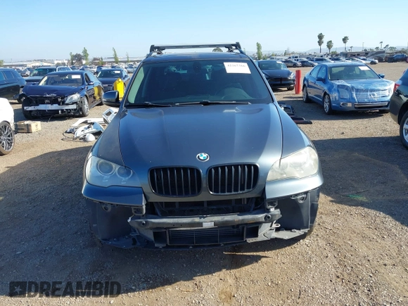 2013 BMW X5 xDrive35i z VIN 5UXZV4C56D0G57030, wystawiony jako IAAI lot #42267366 z przebiegiem 174 381 mil mil oraz . Historia ofert i sprzedaży dostępna na DreamBid. Obrazek 13.