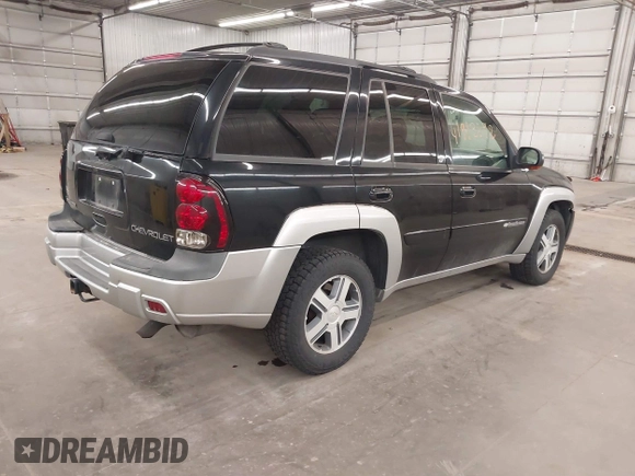 2004 Chevrolet TrailBlazer LS with VIN 1GNDT13S942308362, listed as a IAAI auction lot 41913292 with 153,458 mi miles. Bid and sale history available at carsss.com. Image 4.