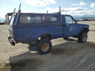 1983 Toyota Pickup z VIN JT4RN48D0D0062446, wystawiony jako Copart lot #59037805 z przebiegiem 157 999 mil mil oraz Czysty tytuł • Clean title. Historia ofert i sprzedaży dostępna na DreamBid. Obrazek 3.
