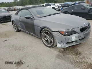 2007 BMW 6 Series M6 z VIN WBSEK93557CY78648, wystawiony jako Copart lot #52179345 z przebiegiem 22 453 mil mil oraz Szkoda całkowita • Salvage title. Historia ofert i sprzedaży dostępna na DreamBid. Obrazek 4.