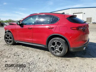 2021 Alfa Romeo Stelvio z VIN ZASPAJAN3M7D00065, wystawiony jako Copart lot #50395315 z przebiegiem Nie podano mil oraz Szkoda całkowita • Salvage title. Historia ofert i sprzedaży dostępna na DreamBid. Obrazek 2.