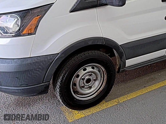 2018 Ford Transit with VIN 1FTBW2ZM8JKA77066, listed as a IAAI auction lot 42642396 with 215,234 mi miles and . Bid and sale history available at DreamBid. Image 21.