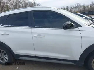 2017 Hyundai Tucson SE with VIN KM8J3CA48HU556569, listed as a IAAI auction lot 41378853 with 67,832 mi miles. Bid and sale history available at carsss.com. Image 13.