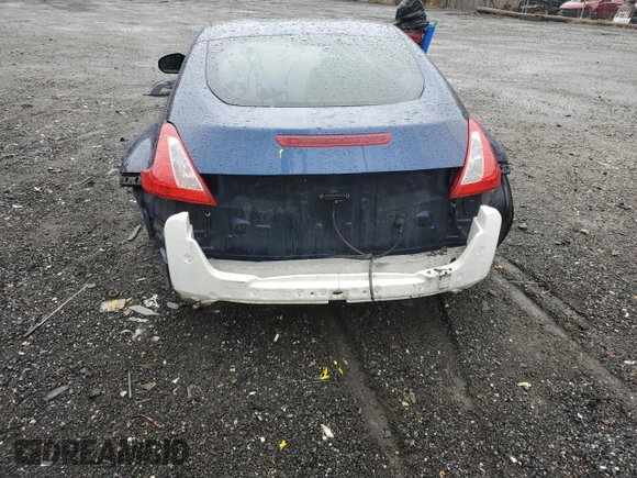 2014 Nissan 370Z with VIN JN1AZ4EH9EM631400, listed as a Copart auction lot 51304805 with 0 mi miles and Salvage Title. Bid and sale history available at carsss.com. Image 6.
